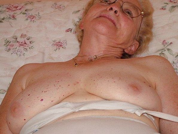 Older Sluts Busty Mature In Boots Showing Big Tits In Motel Room Thumbs